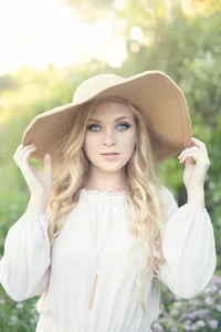 Creative outdoor senior portrait near Minneapolis with natural light and modern posing