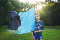 Colorguard posing with flag for senior picture
