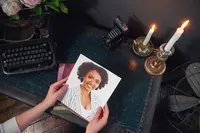 Custom leather portrait album with thick lay-flat pages and full-bleed cinematic images
