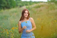 senior girl flower field portrait Minnesota soft pastel tones