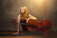 Senior portrait with dramatic studio lighting and cinematic editorial styling in Minneapolis
