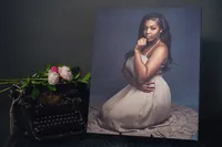 Fine art senior portrait printed on metallic paper with deep color and cinematic finish