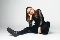 Studio portrait with bright, even light and fresh expression