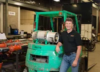 On site professional headshot captured in industrial workspace in Minneapolis Minnesota