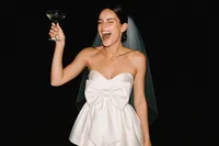 20250707_1810_Bride Celebrating Elegantly_remix_01jzkntfy6fd59pkdzrtjwvbcy