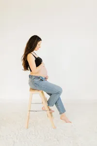 pregnant mother on ladder