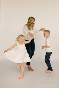 mom in studio dancing with kids