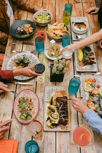 Overhead of a full shared table at Mustangs & Burro