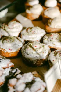 Iced pistachio buns and pastries at a Monterey bakery counter