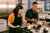 Mei Lin and Jet Tila working side by side at the range during a timed round