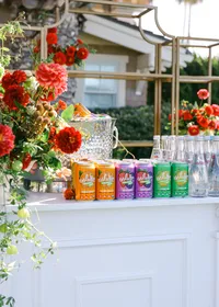 Branded beverage display photographed during a corporate event, highlighting product presentation and styling