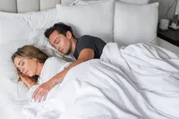 Commercial lifestyle brand photography capturing a calm, at-home sleep moment for wellness and home lifestyle campaigns