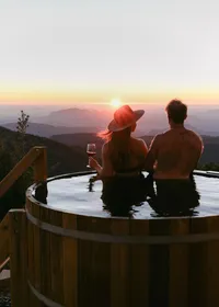 Luxury lifestyle hospitality campaign for cedar hot tub overlooking the mountains at sunset in California
