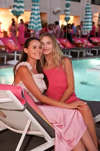 Natural guest interaction photographed during a brand-hosted event with a relaxed, lifestyle approach