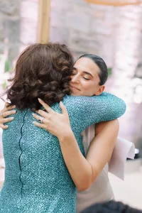 Reception Hug | Elevated Documentary Wedding Photographer in Montreal | Juno by Julia C. Vona