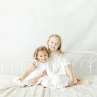 studio portrait of two sisters from a famliy session at Kate Marie Portraiture near Highland Village, Texas