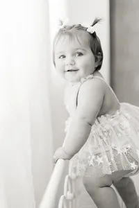 black and white photo of a baby girl's first birthday milestone session at Kate Marie Portraiture's studio in DFW, Texas
