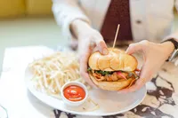 Close up photo of a burger dish at Sip and Savor taken by a Dallas brand photographer