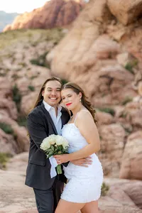 Engaged couples holding each other smiling at the Red Rock Canyon