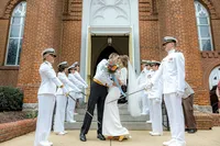 Bride and groom with navy wedding party