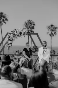 Groom smiling at the alter at his San Diego Wedding