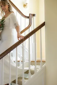 Bride walking down stairs in Asheville, North Carolina