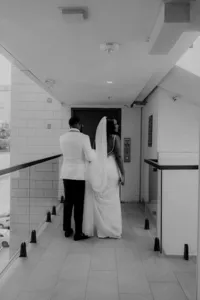 Bride and groom walking away from camera San Diego Wedding