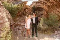 Engagement shoot at the Red Rock Canyon couple smiling at each other