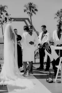 Groom hugging his mom at San Diego wedding