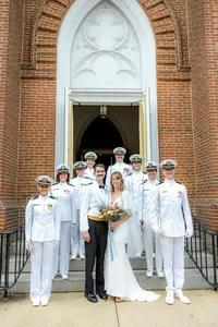 Bride and groom with navy wedding party