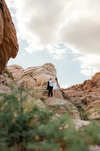 Portrait image of engaged couple on a rock at the Red Rock Canyon