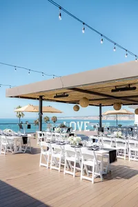 Wedding table scapes at San Diego Wedding with palm trees and ocean in the background