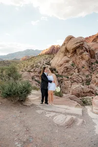 Engaged couples hugging at the Red Rock Canyon