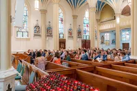 Wedding guests in a chapel for a wedding