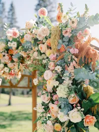 Gorgeous full flower wedding arch at the Everline resort Tahoe