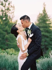 film photo of bride and groom kissing
