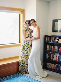 bride and her mom embracing each other