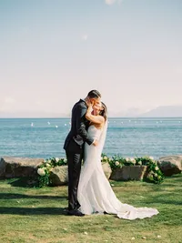 bride and groom first kiss