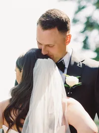 bride and groom embracing