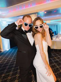 retro photo of bride and groom dancing during their wedding reception
