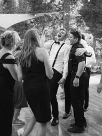 guests laughing at wedding reception