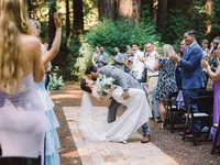 wedding isle kiss by bride and groom