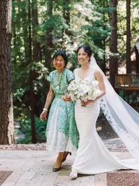 mom walking bride down the isle