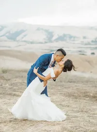bride and groom kiss in el dorado hills winery