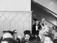 bride and her father entering wedding ceremony