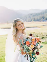 Bride is posing for her portraits during the sunset at Everline resort