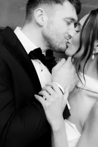 detail editorial wedding photo of bride and groom kissing at marylebone town hall