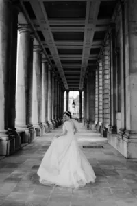 Cinematic wedding photography of bride running away at naval college london
