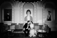 creative wedding photo of bride and groom kissing in an andaz bar at night with direct flash