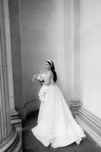 editorial wedding portrait of bride looking away at marylebone steps